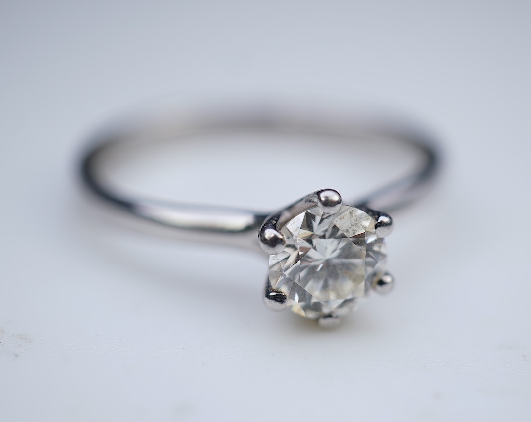 A diamond solitaire ring